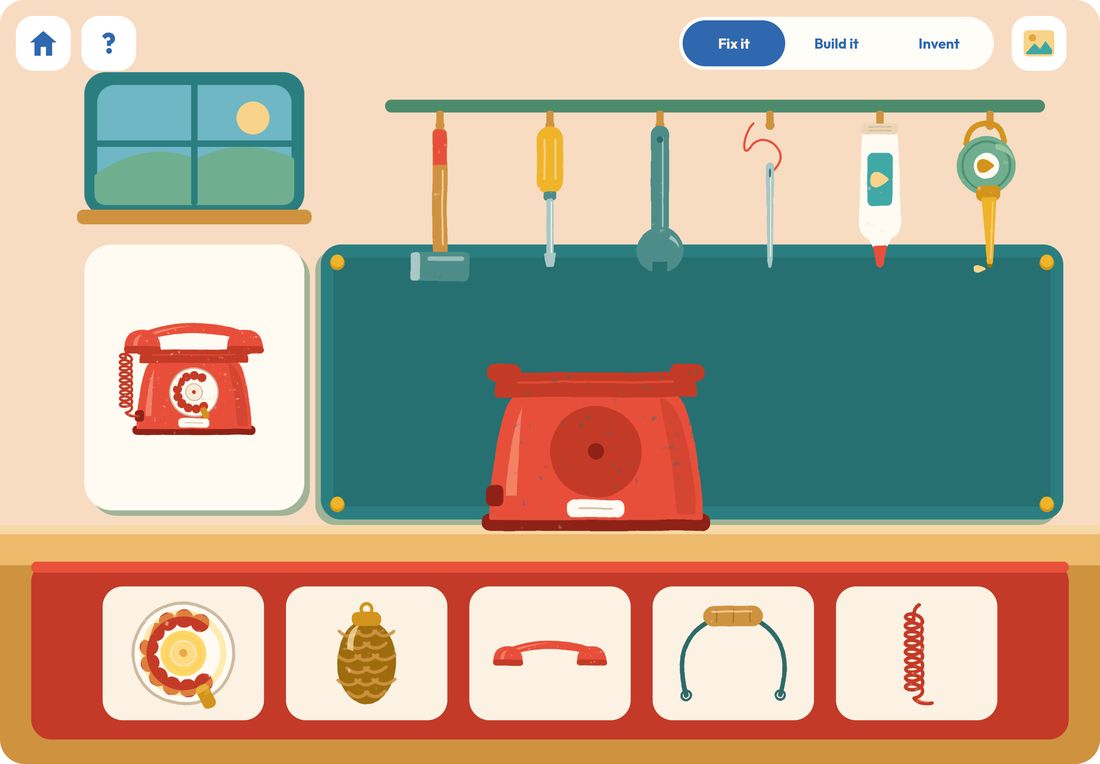 The treasure workshop: an old red telephone on the bench, tools on the wall and parts in the tray